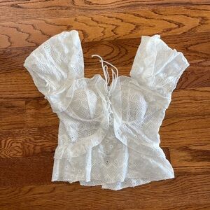 Frilly pointelle eyelet blouse